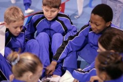 gymnasts gather in a circle